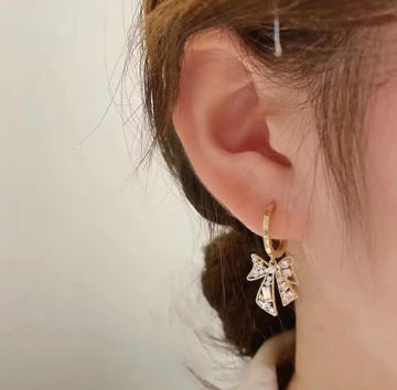 Elegant Bow Stone Huggie Earring - SubhagAlankar