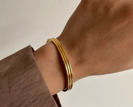 Chic Sleek Gold Finish Bangle Bracelet - SubhagAlankar