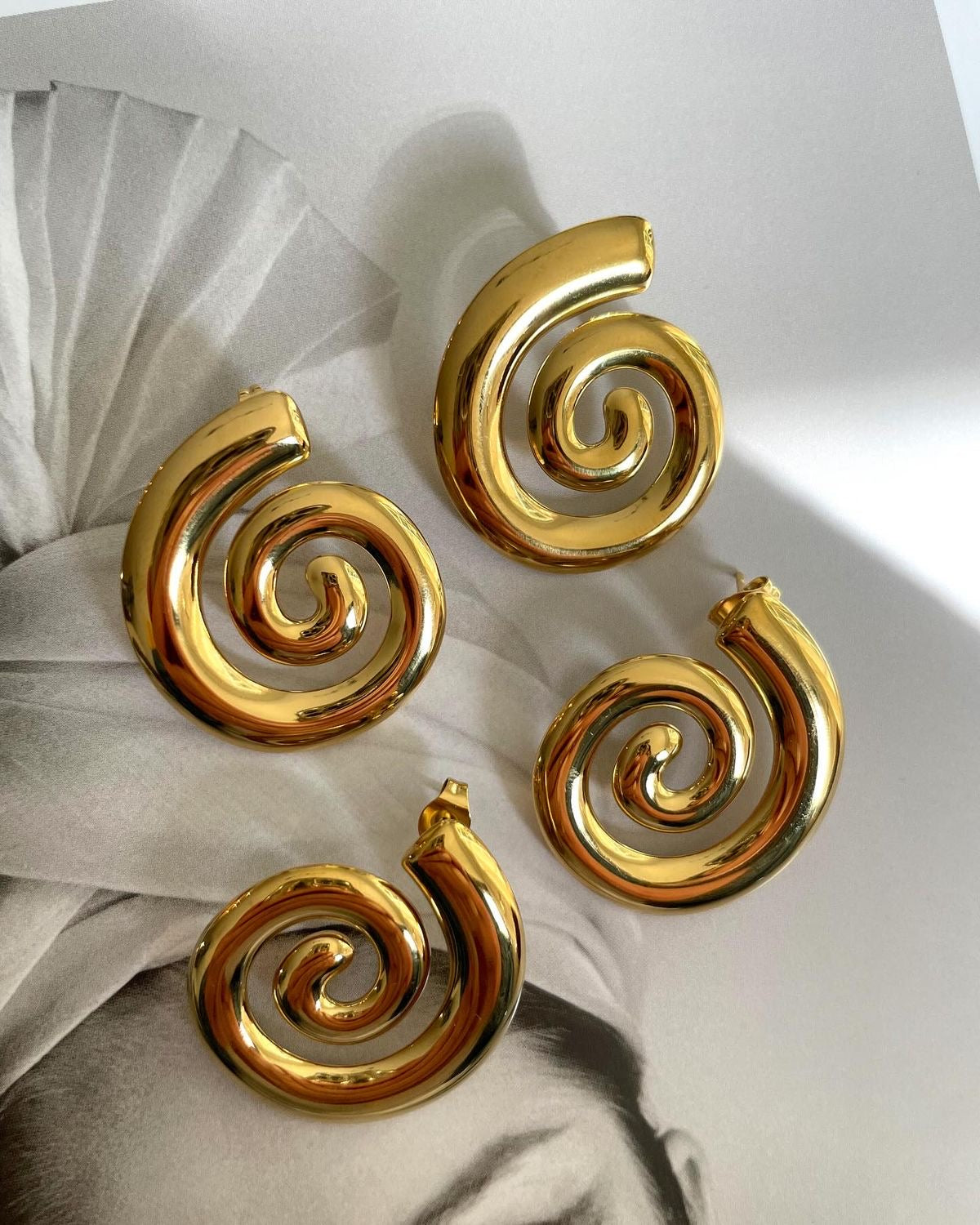 Golden Swirl Statement Earrings