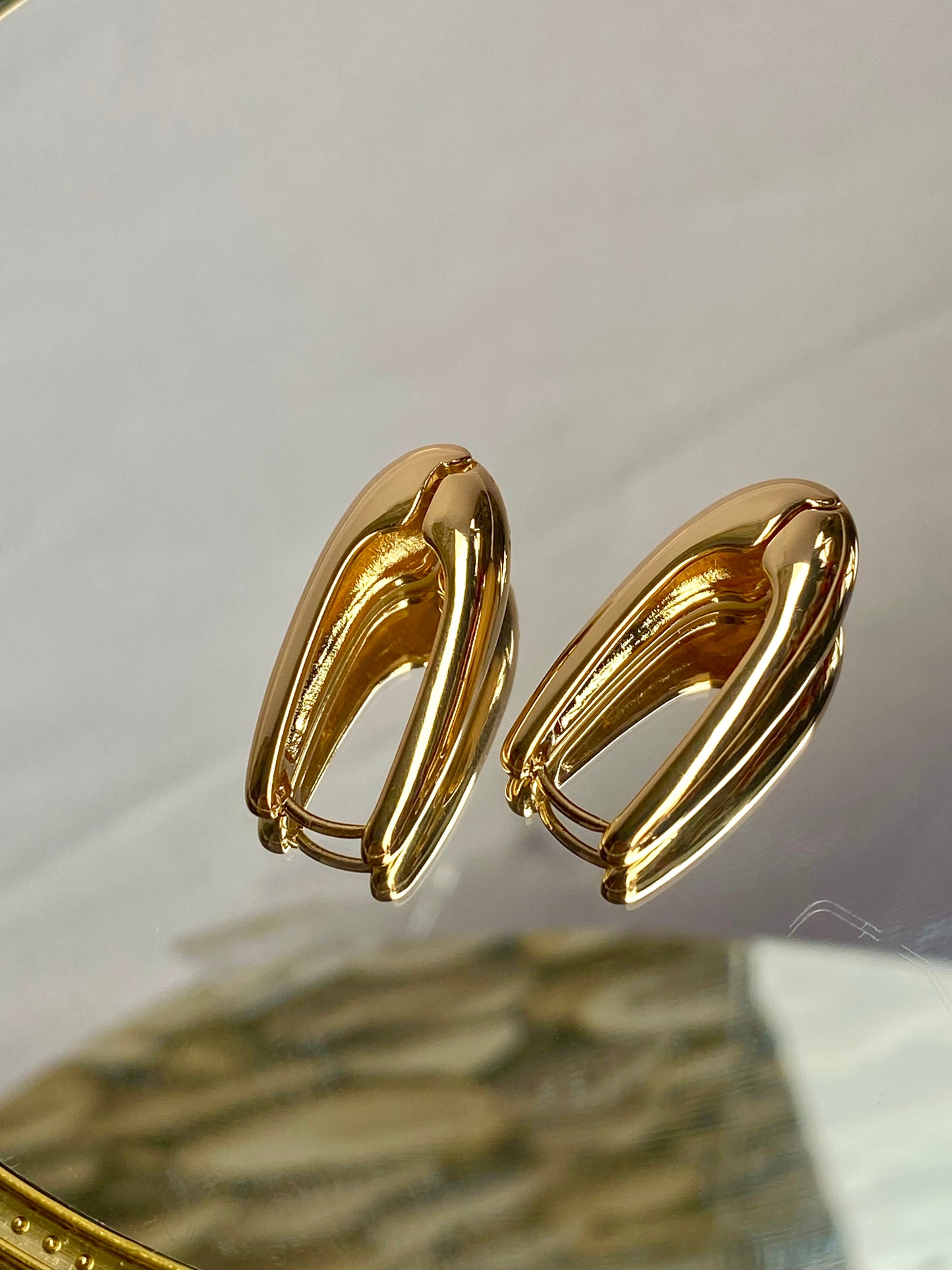 'U' shaped Statement Gold Stud Earring