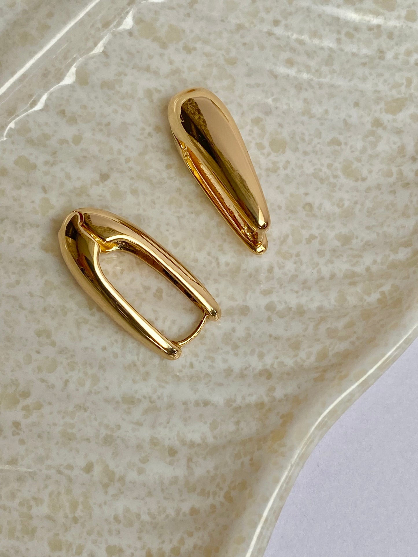 'U' shaped Statement Gold Stud Earring