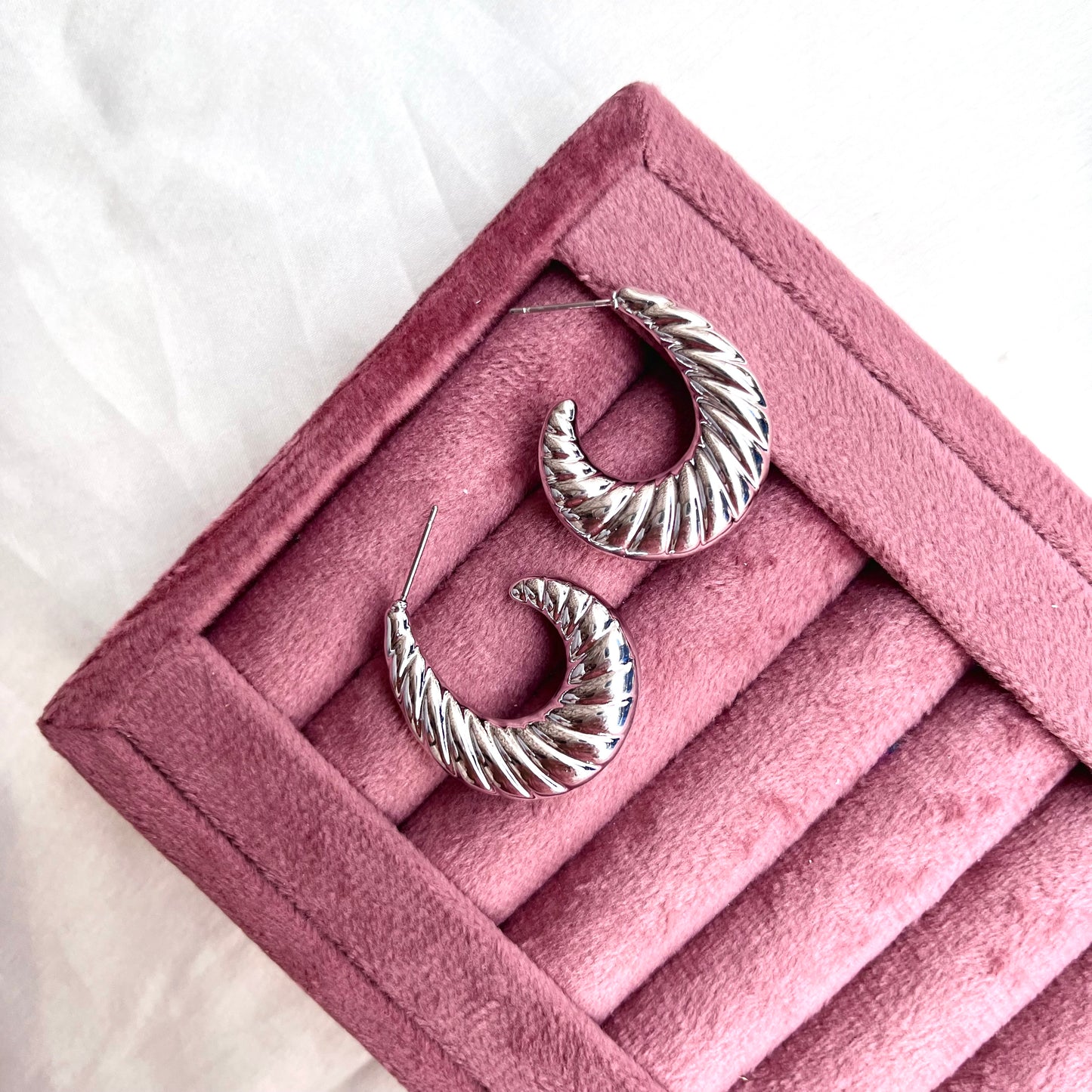 Twisted Horn Silver Tone Earrings